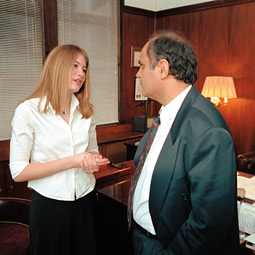 Katie Johnson discusses matters with the Cypriot ambassador to the United Nations, Soto Zackheos. Don Hamerman