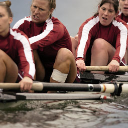 Varsity Four rowers Debbie Curry, Beth Winsper, Anna Lazarova, and Pam Foley rise to the challenge of rowing. Robert Hubner