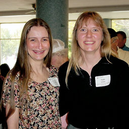 Michele Candela, with Distance Degree instructor Faith Lutze (political science), 2002 Commencement weekend.