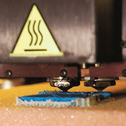 A fused deposition modeling machine uses rapid prototyping to build the bone imitation. The head of the machine moves like a fancy glue gun, squeezing out a heated polymer. Building one layer at a time, the machine generates a three-dimensional model. Robert Hubner