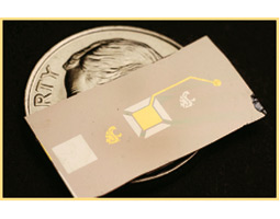 At three millimeters square, the P3—the yellow patch in the rectangle—is the world's smallest engine.