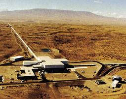When a gravitational wave passes through the LIGO facility at Hanford, it will cause the 2.5 mile distance between the mirrors and beam splitter to, very slightly, alternately lengthen and shorten. When a gravitational wave passes through the LIGO facility at Hanford, it will cause the 2.5 mile distance between the mirrors and beam splitter to, very slightly, alternately lengthen and shorten.