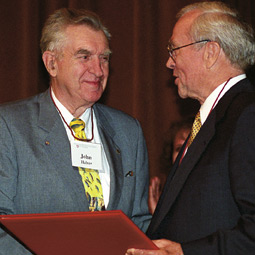 John E. Halver, left, with R. James Cook, interim dean of the College of Agricultural, Human, and Natural Resource Sciences.