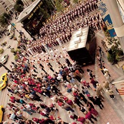 On a Friday afternoon in late summer, the Cougar Marching Band plays the fight song in downtown Seattle. On a Friday afternoon in late summer, the Cougar Marching Band plays the fight song in downtown Seattle.