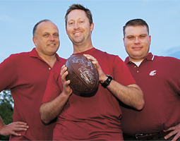 Jeff McQuarrie '98, producer of <em>Legends of the Palouse,</em> is flanked by the film's narrator, George Hollinbery '76 (left), and Alexander Bohler, grandnephew of former WSU athletic director J. Fred 'Doc' Bohler.