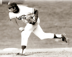 Joe McIntosh pitching for the Cougars. From Little League on, McIntosh wore number 7—Mickey Mantle's number.