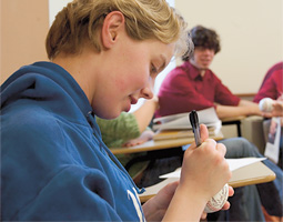 At the semester's end, students in Linda Kittell's class autograph baseballs for each other.