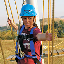 Andrea Blair Cirignano '05 learns to overcome her fears high above the ground in Washington State University's Challenge Course.