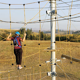 Andrea Blair Cirignano '05 learns to overcome her fears high above the ground in Washington State University's Challenge Course.