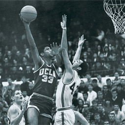 Jim McKean '68, '74 doing his best to block Lew Alcindor. Jim McKean '68, '74 doing his best to block Lew Alcindor.