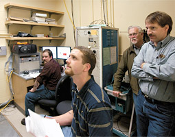 In the safety of the protected control room in the ISP impact lab, the team fires the new fun for the first time.