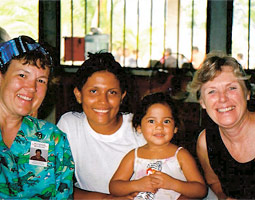 Tamara Norton ('04 MS Nurs.), Honduran clients, and Rita Catching.