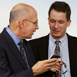 Gregory Belenky, M.D. and Hans Van Dongen of the Sleep Research Institute at WSU Spokane use handheld devices to check the sleep habits and reaction times of their sleep study volunteers.