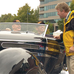 Jeff Clark '83 admires the object of his desire, a 1939 Bugatti Type 57C roadster once owned by the Shah of Iran. He matched his knowledge of the community with a friend's car connections to organize the annual Concours d'Elegance in Kirkland.