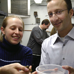 Andrew Storfer with a student of the School of Biological Sciences.