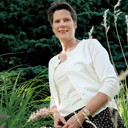 WSU Master Gardener Program director Tonie Fitzgerald among the ornamental grasses at the 'Green Zone'—an interpretive center at Spokane County Extension. <em>Zach Mazur</em>