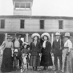 A group pose with a dog in this 1909 photograph of the hotel. <em>Photo courtesy of WSU - MASC.</em>