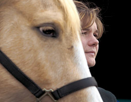 Campbell, here with a horse from a teaching herd, will spend the summer working at a dairy-focused practice in the Yakima Valley.