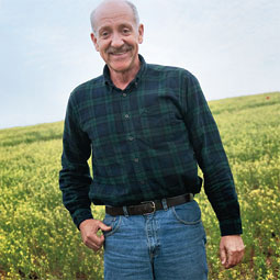 Agronomist Bill Schillinger in a camelina field at WSU's Lind state. By Zach Mazur