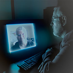 Paul Bolls (left) and Darrel Muehling studied reactions to a different screen—the TV—and found fast-paced commercials drew attention to their execution but not their content. <em>Photoillustration Zach Mazur/Staff</em>