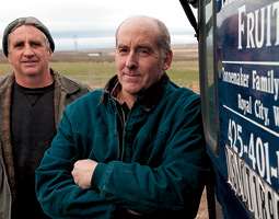 Kurt Tonnemaker &rsquo;84, right, and his brother Kole at their Royal City farm. <em>Zach Mazur</em>