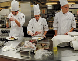 WSU students prepare a Feast of the Arts dinner in the College of Business’s commercial kitchen. <em>Zach Mazur</em>