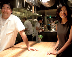 Marjorie Chang Fuller ’89, ’90 with her husband chef Mark Fuller at their Spring Hill (now Ma&rsquo;ono) restaurant in West Seattle. <em>Zach Mazur</em>