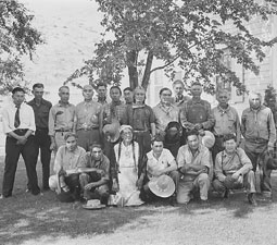 The 1941 photograph features the early members of the Colville Business Council and some of the hereditary chiefs. Peter Gunn is in the first row, second from the right. Chief Jim James is in the center of the second row with a bandana around his neck and braids.