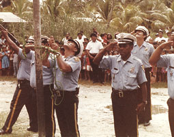 Bryan Vila (second row) joins police officers--his trainees--in a 1979 ceremony to celebrate Kosrae's status as a state in the newly formed Federated States of Micronesia. <em>Courtesy Bryan Vila</em> Bryan Vila (second row) joins police officers--his trainees--in a 1979 ceremony to celebrate Kosrae's status as a state in the newly formed Federated States of Micronesia. <em>Courtesy Bryan Vila</em>