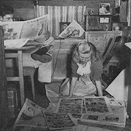 A Trailerville family relaxing on a Sunday in their 21-foot home. From the WSU Powwow, December 1946