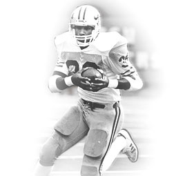 Rueben Mayes '92, '00 M.B.A, carries the ball in the historic 1984 game against Oregon. Photo Kevin Morris-U. Oregon.