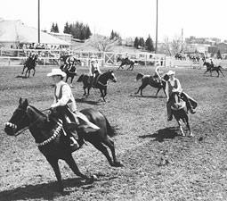 Students perform on their horses at the Hilltop Stables arena.