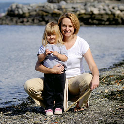 Lara Hermann '95 is leading a community effort to complete a seven-mile pedestrian path from downtown to Point Defiance Park. Hermann often walks along Tacoma's waterfront with her daughter, Amelia Rose Herrmann Scholbe.