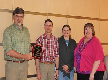 Darrel Nelson, second from left, stands with Steve Simasko, Cynthia Faux and Becky Morton who all nominated Darrel for his outstanding contributions to WSU Pullman.